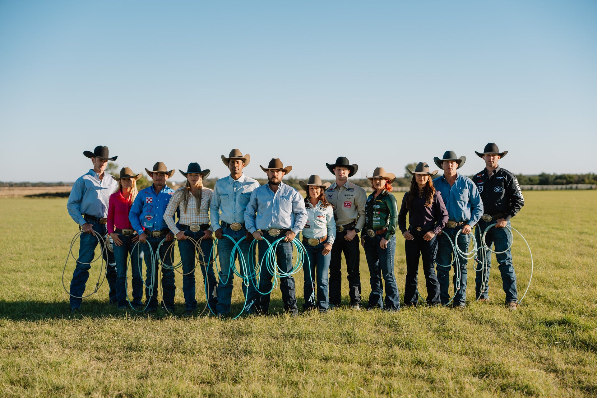 Prohats athletes standing outdoors in western hats